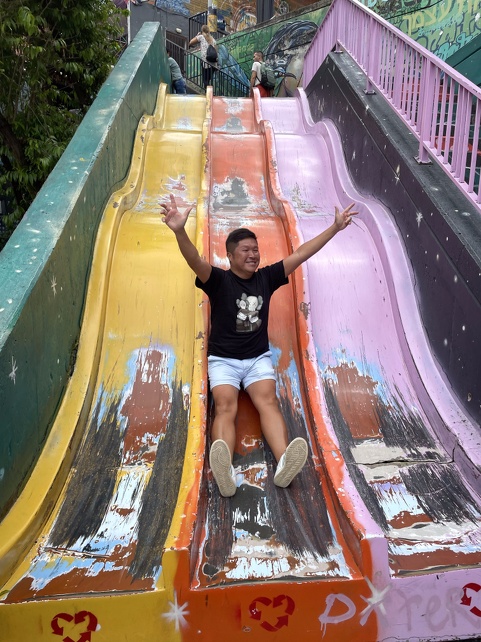Matt from Hong Kong rides the slide