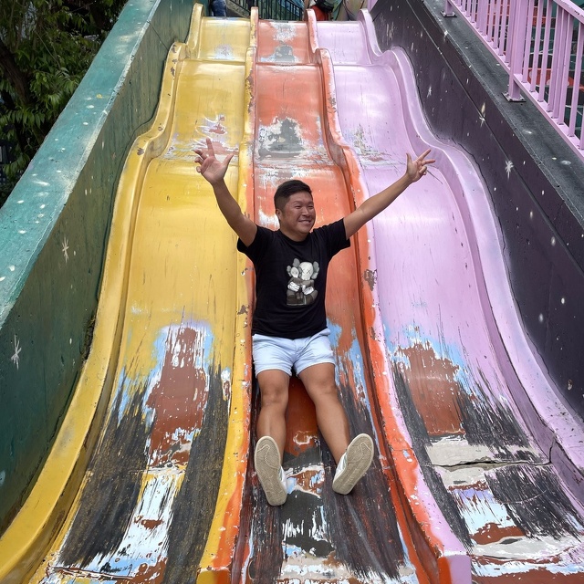 Matt from Hong Kong rides the slide