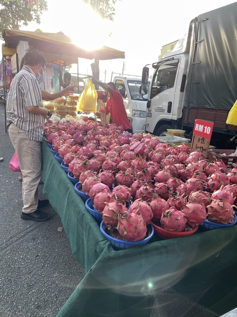 Night market - Fruit stall - Pomegranates?