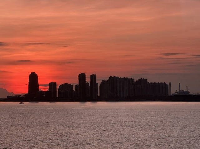 Sun setting over the Johor Strait
